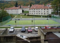 Venkovní hrací plocha s pískovištěm a umělým povrchem na ulici P. Jilemnického, Adamov III